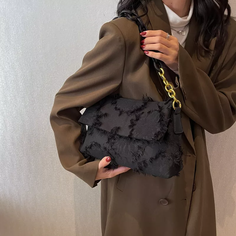 Cartera con eslabones baguette