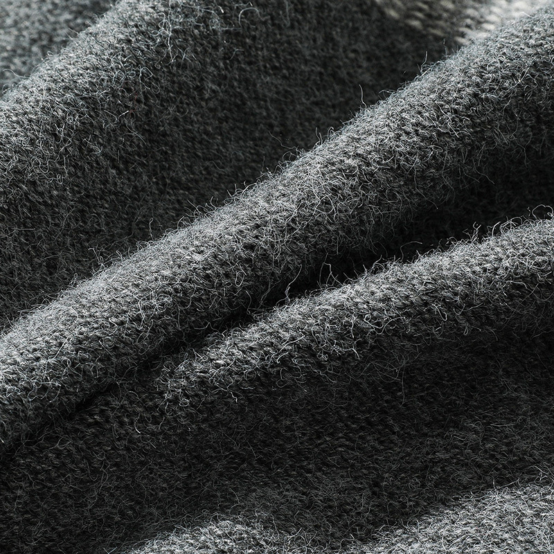 Abrigo oversize de punto jacquard con ribete de pelo a juego