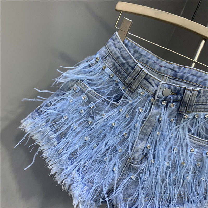 Shorts de pierna ancha desgastados con flecos