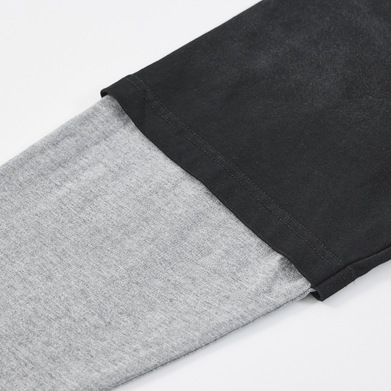 Camiseta oversized vintage de manga completa con gráfico desgarrado y capas superpuestas