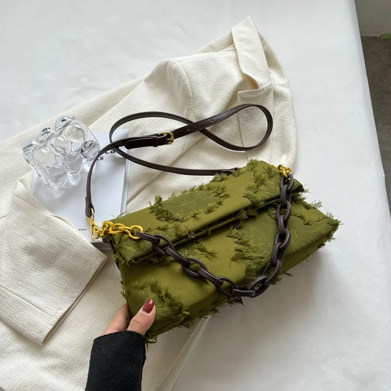 Cartera con eslabones baguette