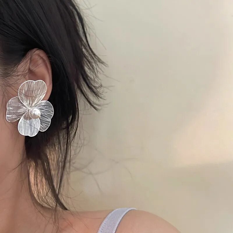 Aretes de cuentas florales de plata