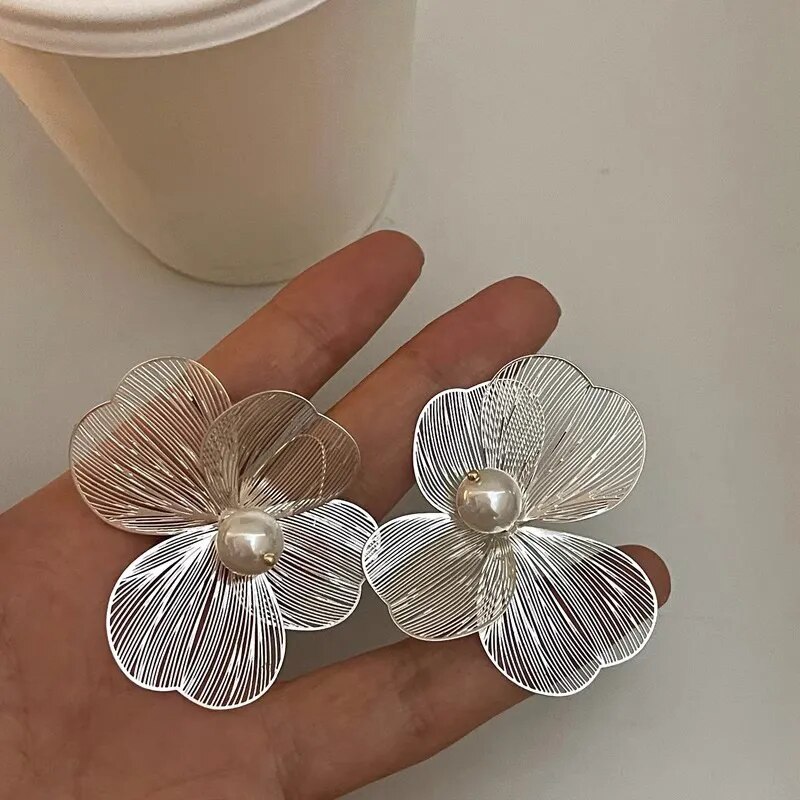 Aretes de cuentas florales de plata