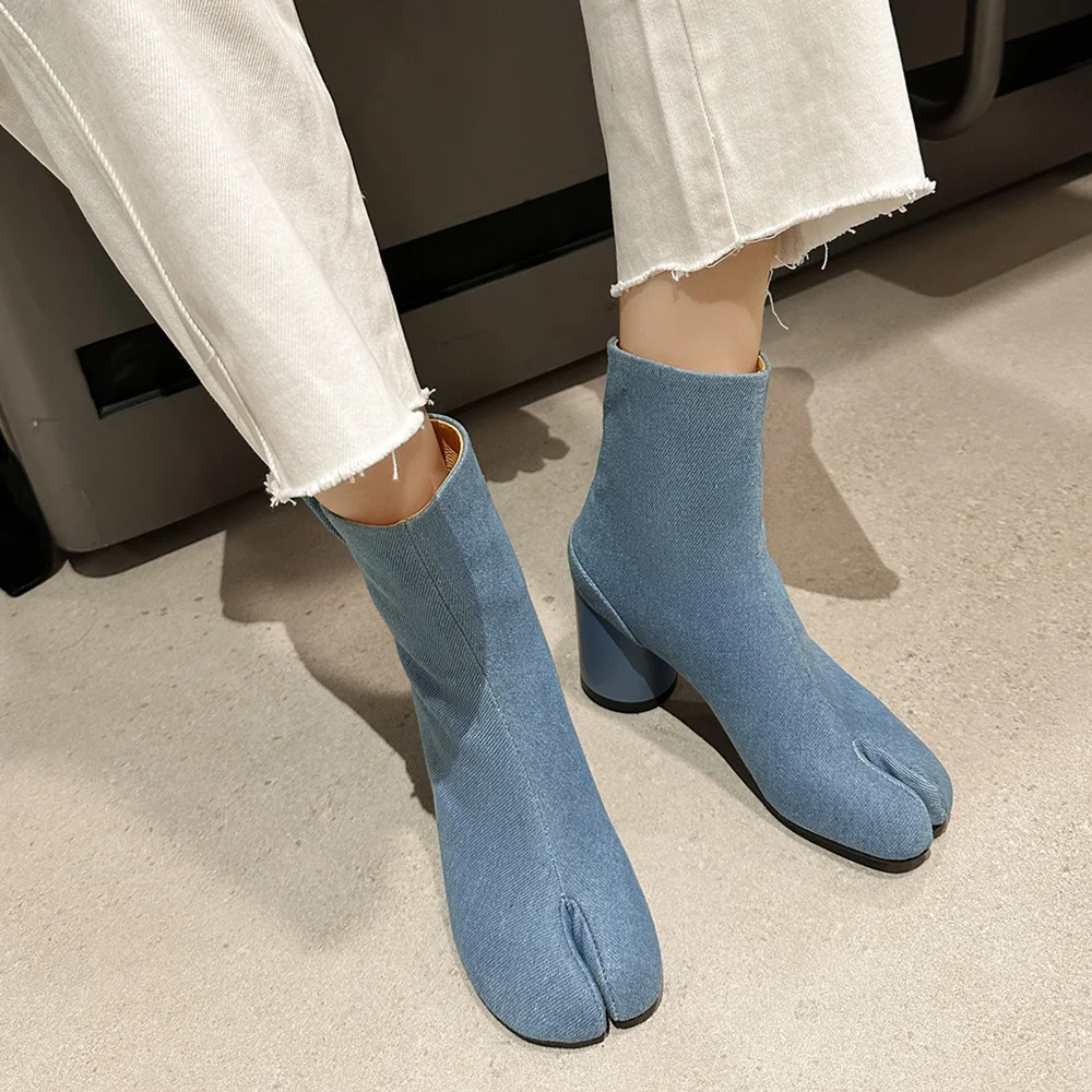Botas clásicas de cuero de punta puntiaguda y tacón ancho