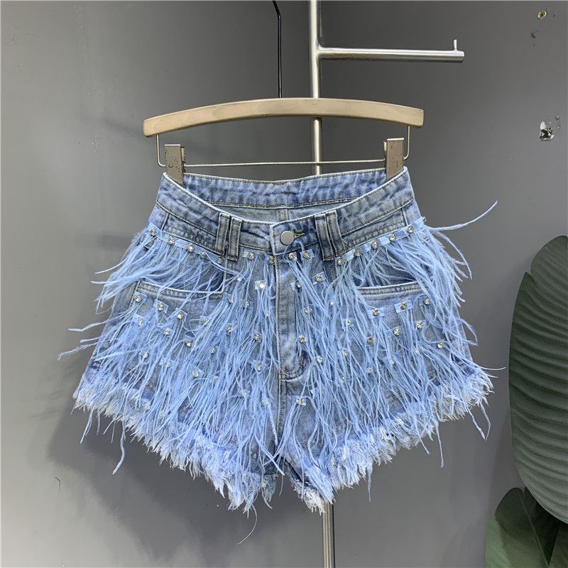 Shorts de pierna ancha desgastados con flecos
