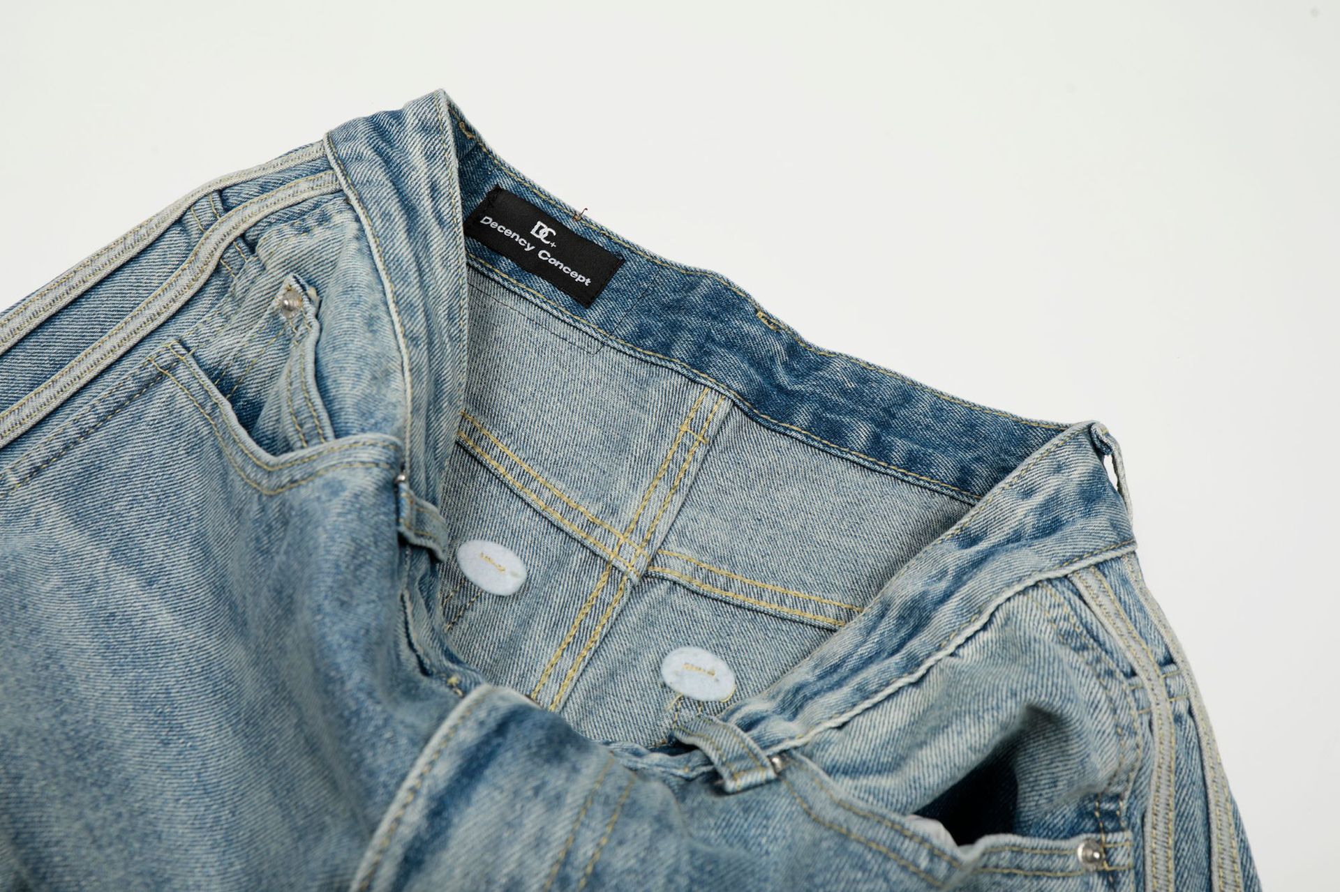 Pantalones vaqueros holgados retro de índigo lavado a la piedra con ribete de contraste