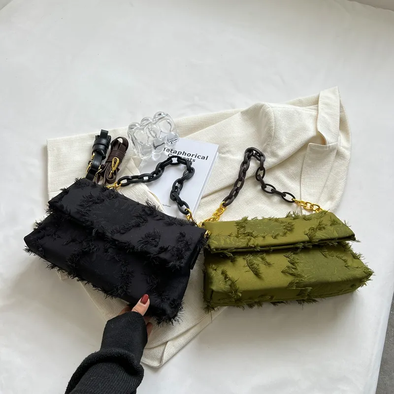 Cartera con eslabones baguette