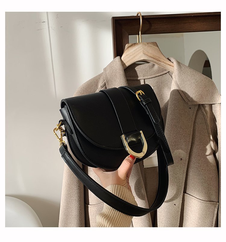 Mini bolso bandolera curvo de poliuretano