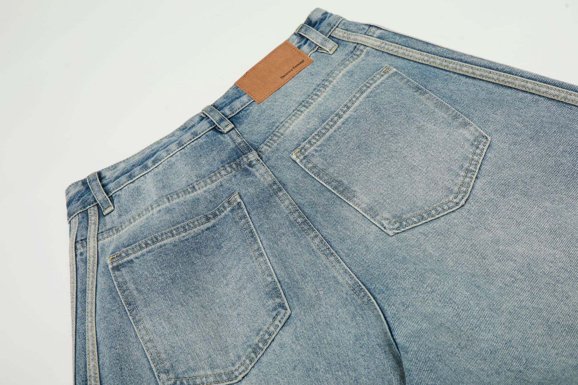 Pantalones vaqueros holgados retro de índigo lavado a la piedra con ribete de contraste