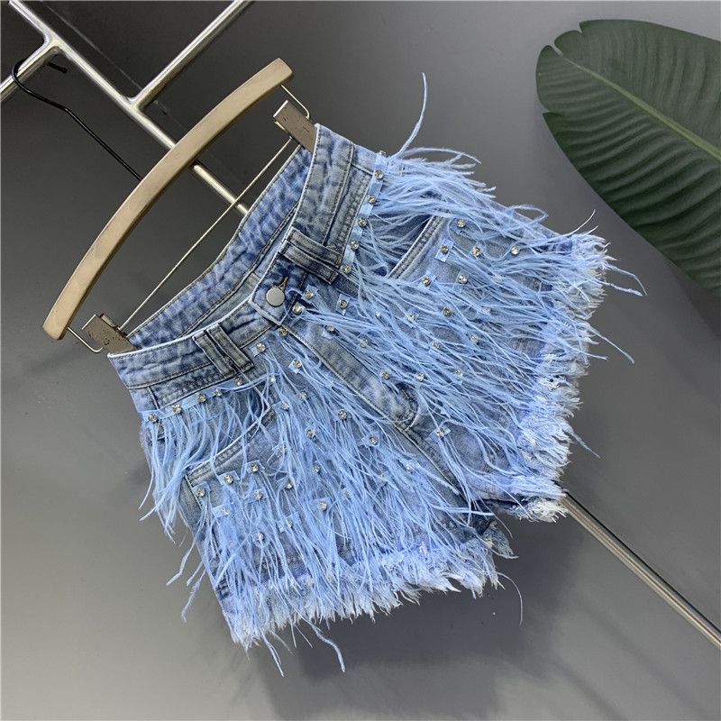 Shorts de pierna ancha desgastados con flecos