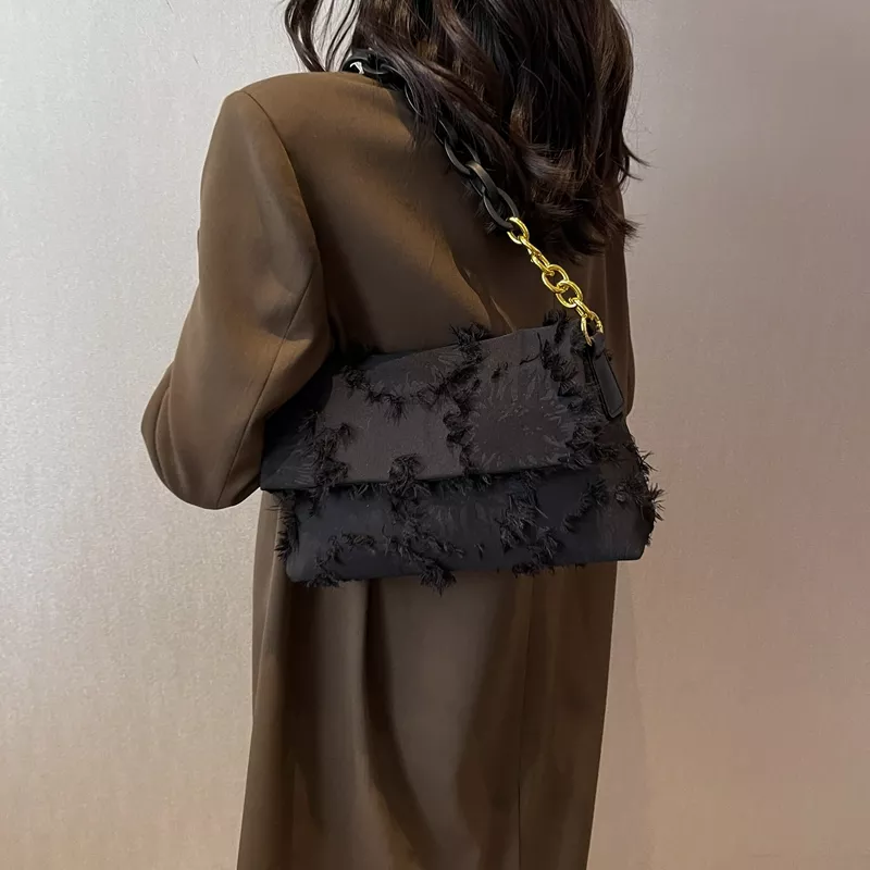 Cartera con eslabones baguette