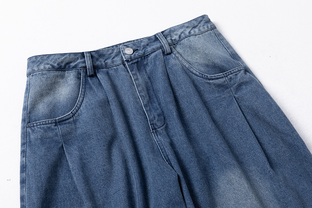 Jeans de mezclilla desgastada de corte relajado
