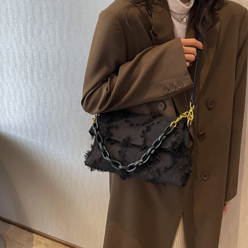 Cartera con eslabones baguette