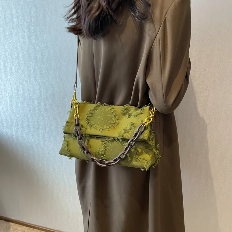 Cartera con eslabones baguette