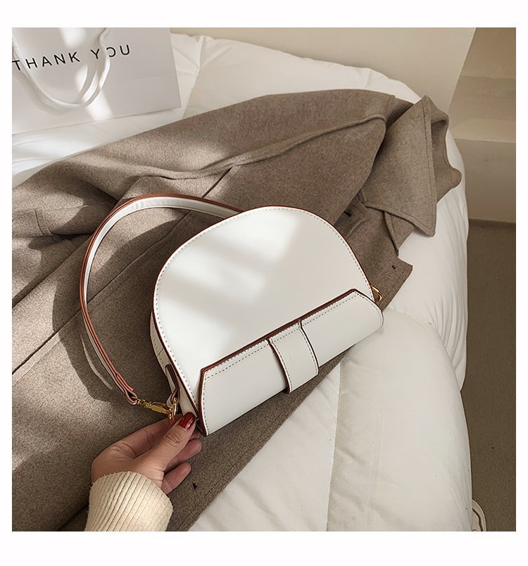 Mini bolso bandolera curvo de poliuretano