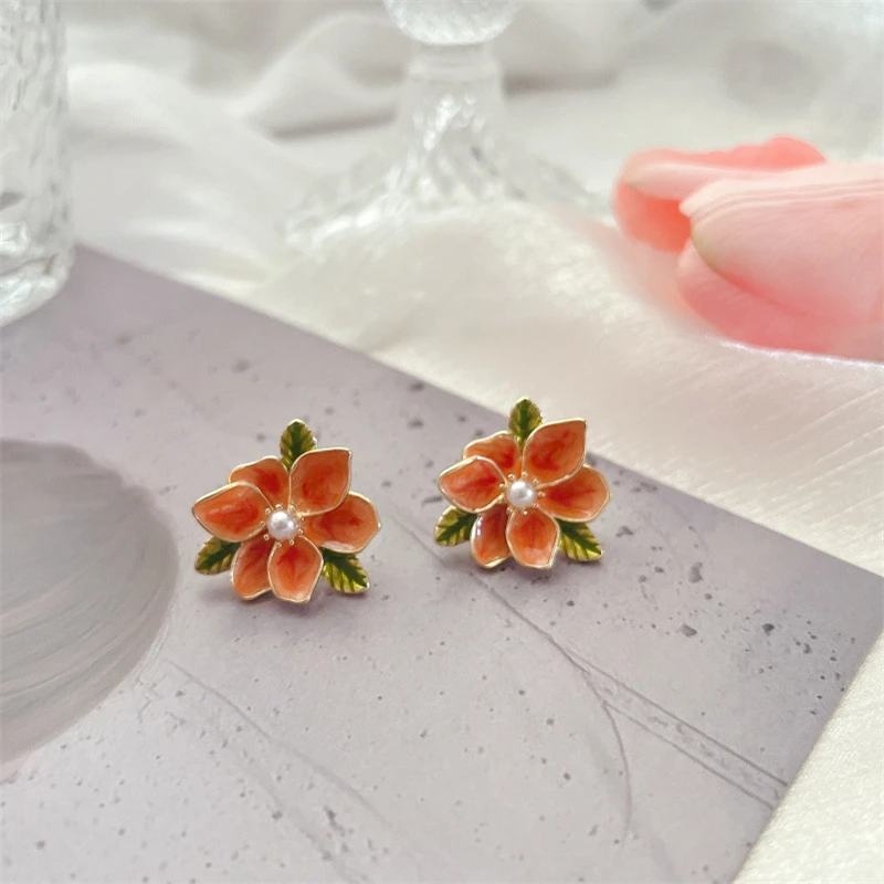 Aretes florales retro de cuentas falsas para mujer