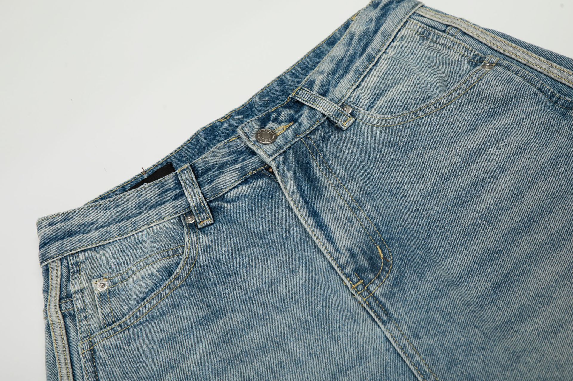 Pantalones vaqueros holgados retro de índigo lavado a la piedra con ribete de contraste