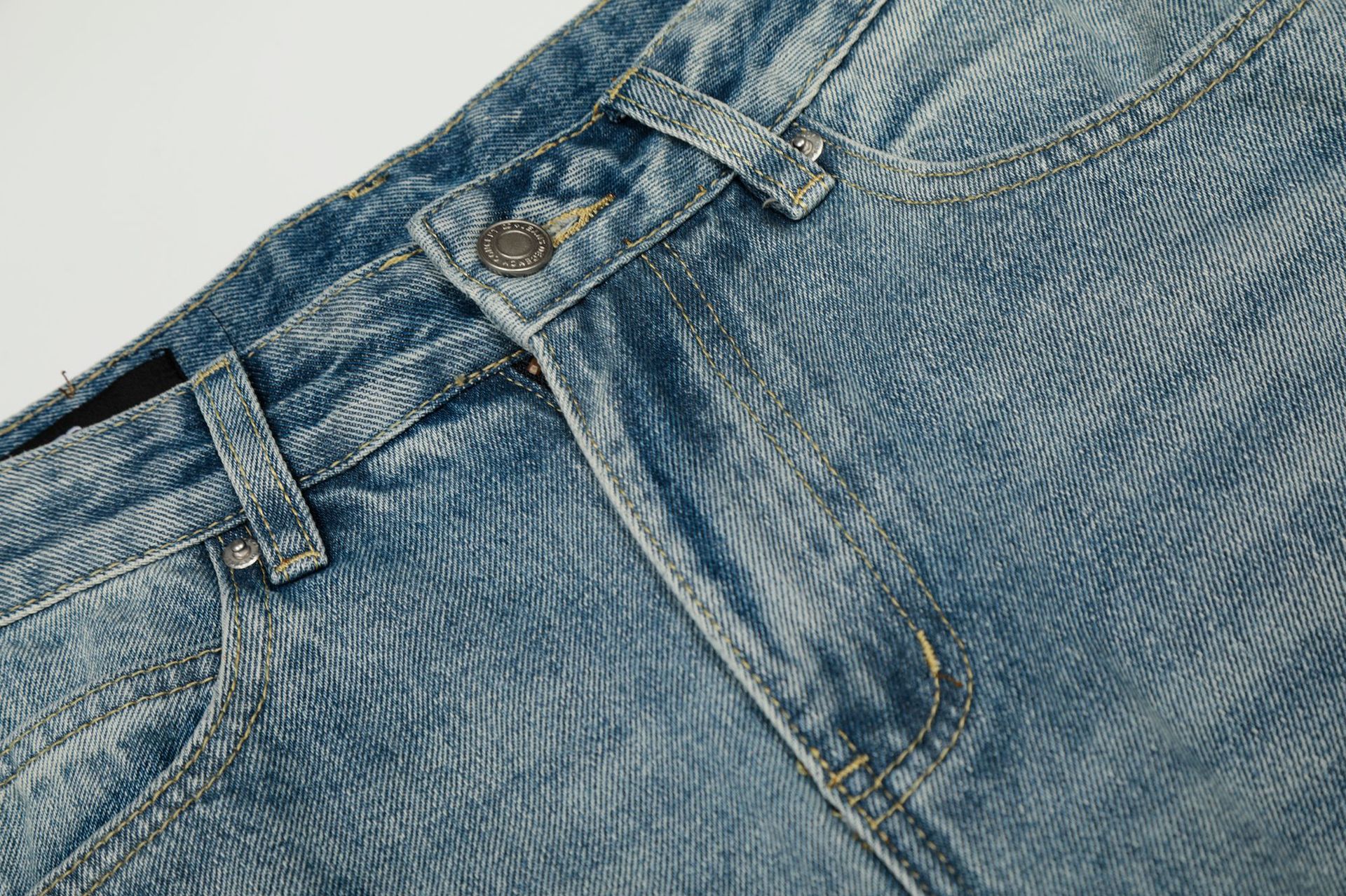 Pantalones vaqueros holgados retro de índigo lavado a la piedra con ribete de contraste