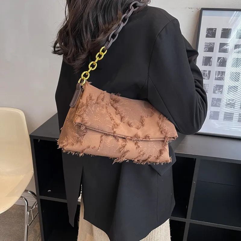Cartera con eslabones baguette