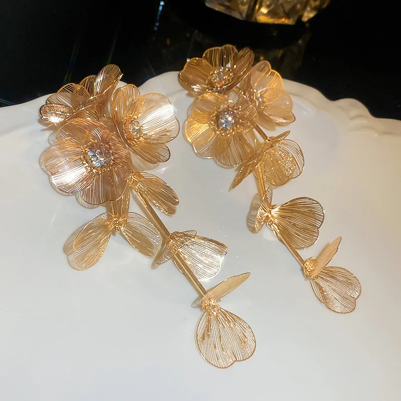 Aretes de cuentas florales de plata