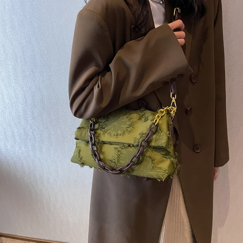 Cartera con eslabones baguette