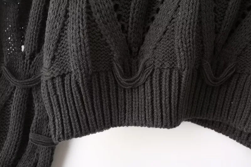Suéter para damas holgado de cuello redondo liso con calado