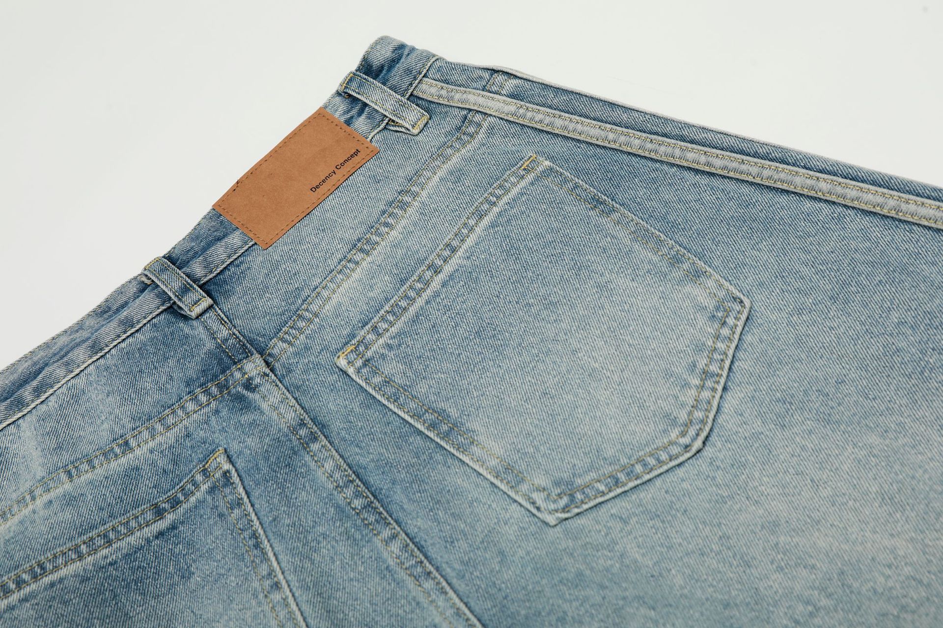 Pantalones vaqueros holgados retro de índigo lavado a la piedra con ribete de contraste