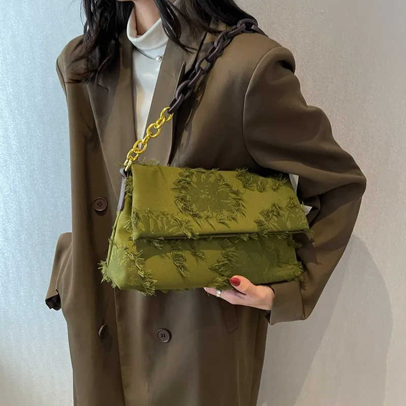 Cartera con eslabones baguette