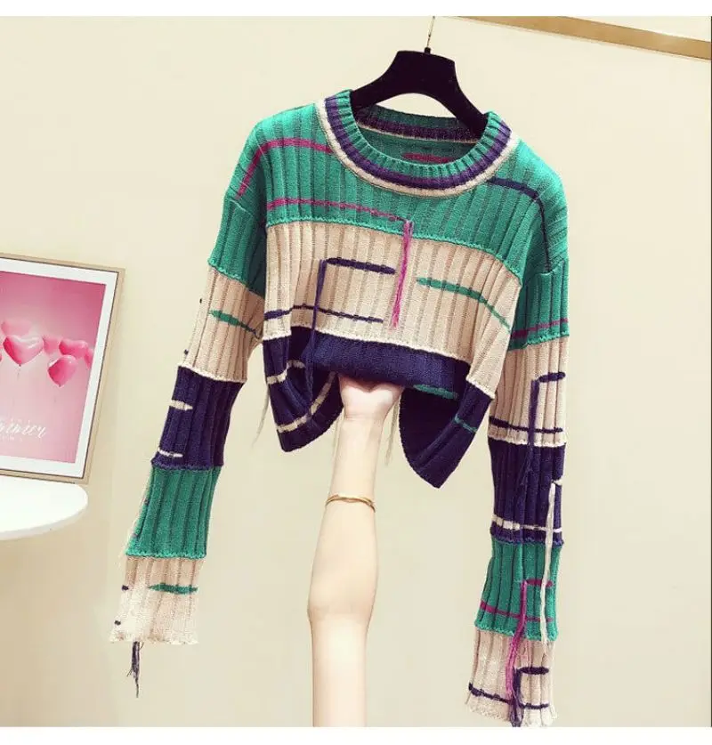 Suéter de mujer con bloques de color, flecos y cuello redondo
