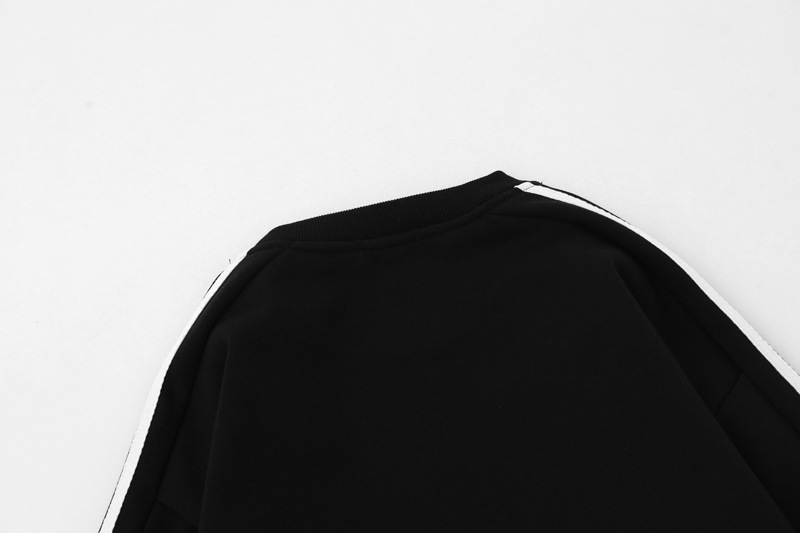 Sudadera con capucha holgada de algodón a rayas para hombre